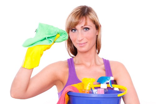 Professional home cleaners in E3 maintaining a tidy living room