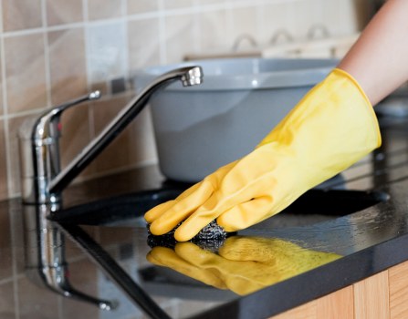 Professional office cleaners in E3 cleaning a modern workspace
