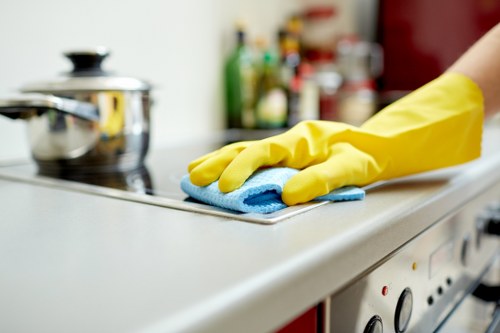 Professional carpet cleaning team following safe work practices