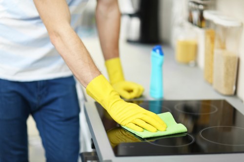 Carpet cleaner applying controlled cleaning methods in a room